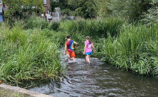 Children in river at Chesham Moor